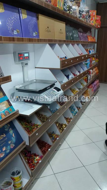 شرکت ویستا افرند-اجرای دکوراسیون داخلی فروشگاه های شیرین عسل